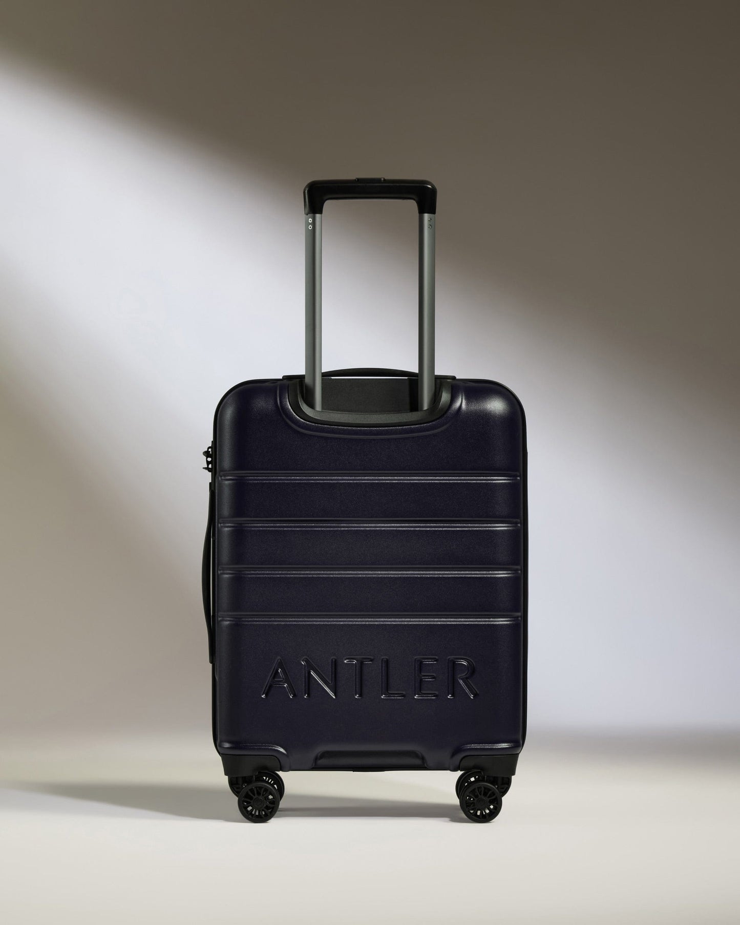 Antler Luggage - Cabin Suitcase in Dark Purple - Logo - Hard Suitcase - Standard Cabin Cabin Suitcase Dark Purple - Logo | Lightweight Hard Shell Luggage