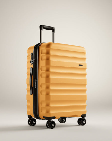 Antler Luggage -  Clifton medium in ochre - Hard Suitcases Clifton Medium Suitcase Ochre (Yellow) | Hard Suitcase | Antler UK