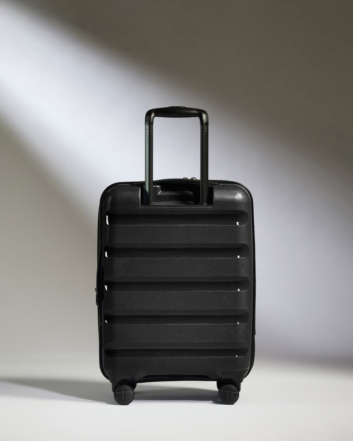 Antler Luggage - Expandable Cabin Suitcase in Black - Logo Stripe - Hard Suitcase - Expander Cabin Expandable Cabin Suitcase Black - Logo Stripe | Lightweight Hard Shell Luggage