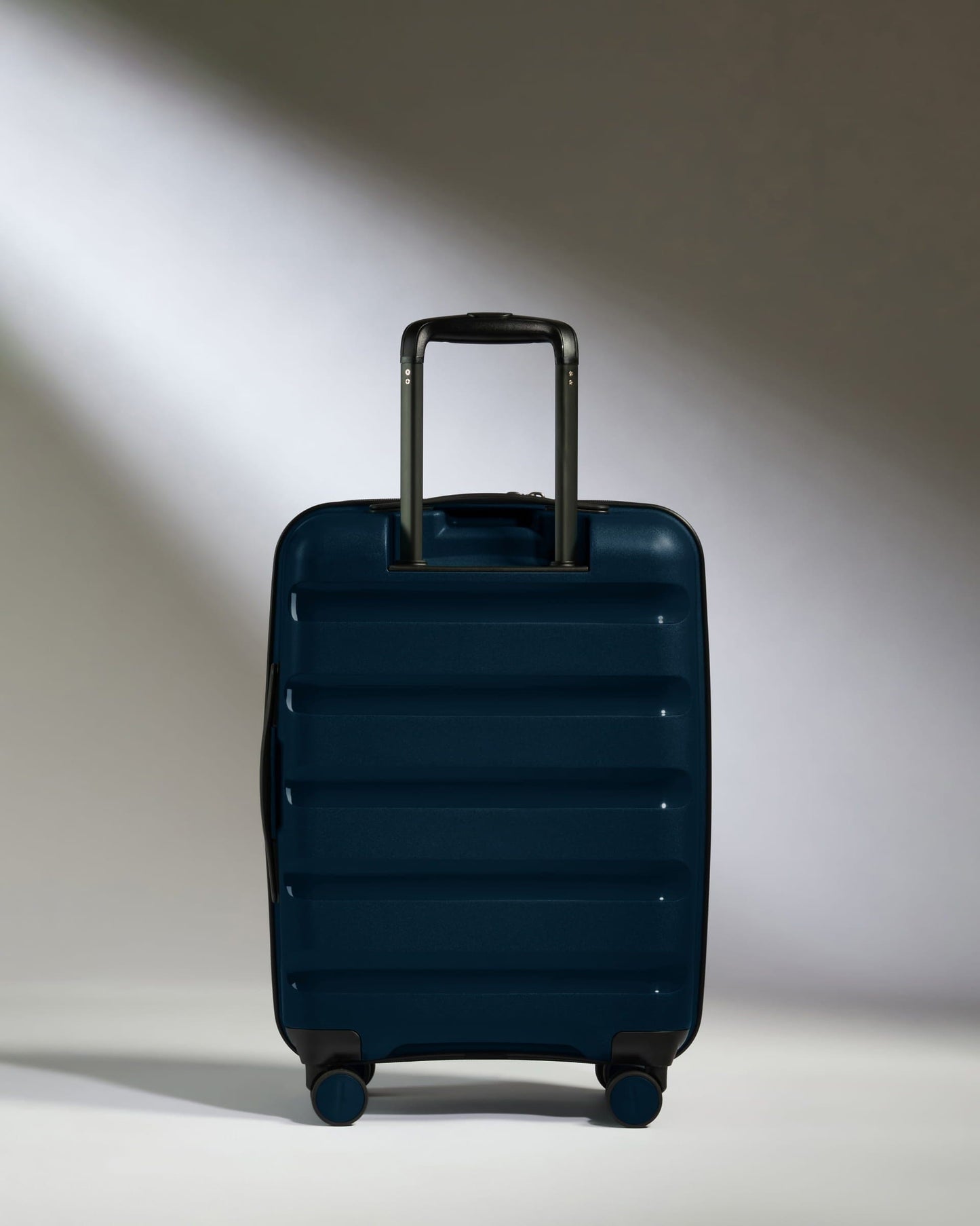 Antler Luggage - Expandable Cabin Suitcase in Midnight Blue - Logo Stripe - Hard Suitcase - Expander Cabin Expandable Cabin Suitcase Midnight Blue - Logo Stripe | Lightweight Hard Shell Luggage