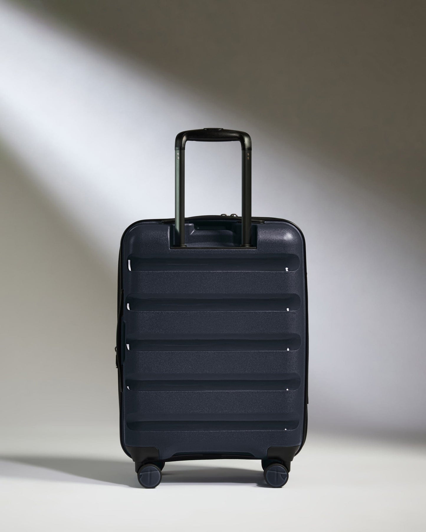 Antler Luggage - Expandable Cabin Suitcase in Navy - Logo Stripe - Hard Suitcase - Expander Cabin Expandable Cabin Suitcase Navy - Logo Stripe | Lightweight Hard Shell Luggage