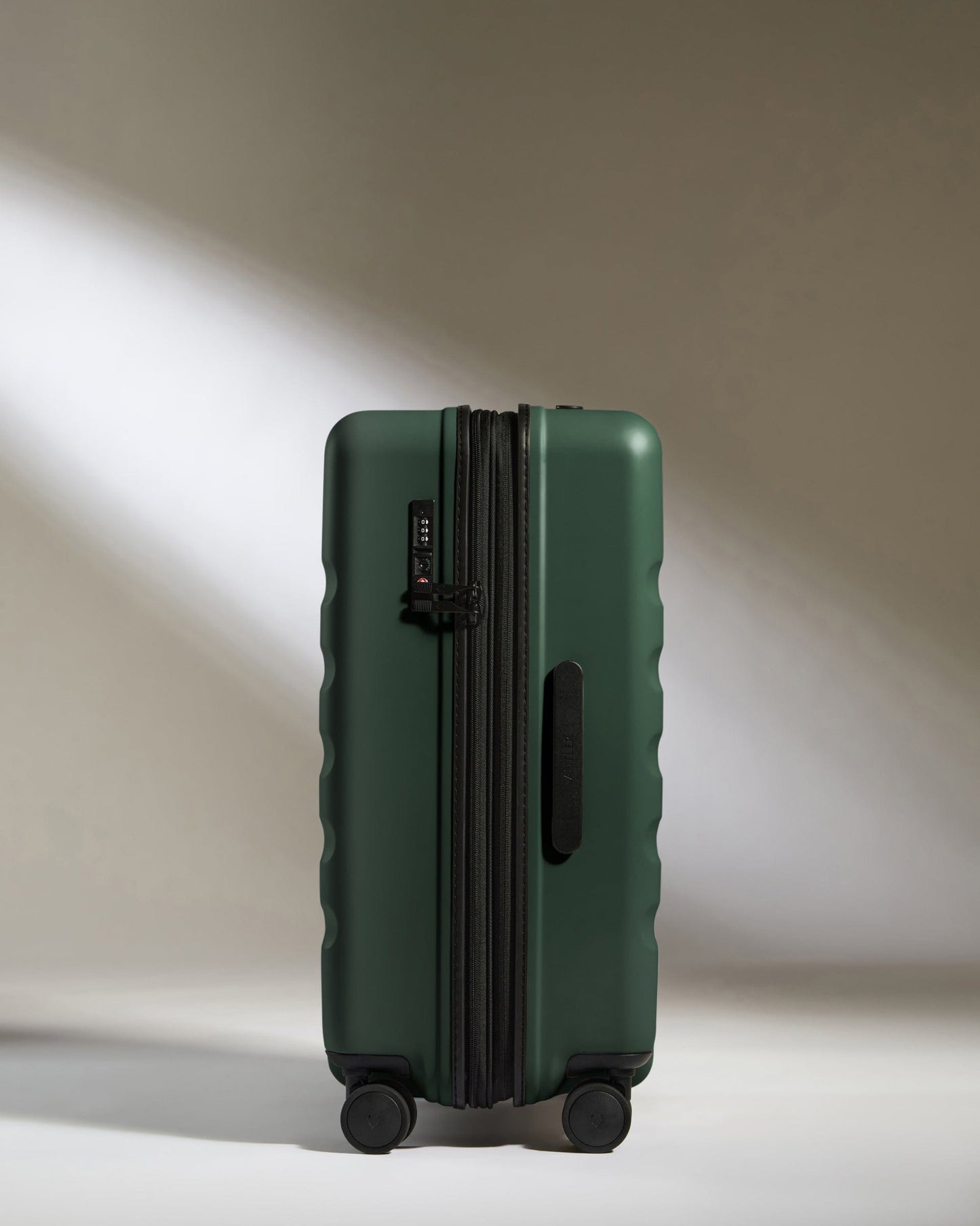 Antler Luggage -  Icon Stripe Medium in Antler Green - Hard Suitcase Icon Stripe Medium Suitcase in Green | Lightweight & Hard Shell Suitcase