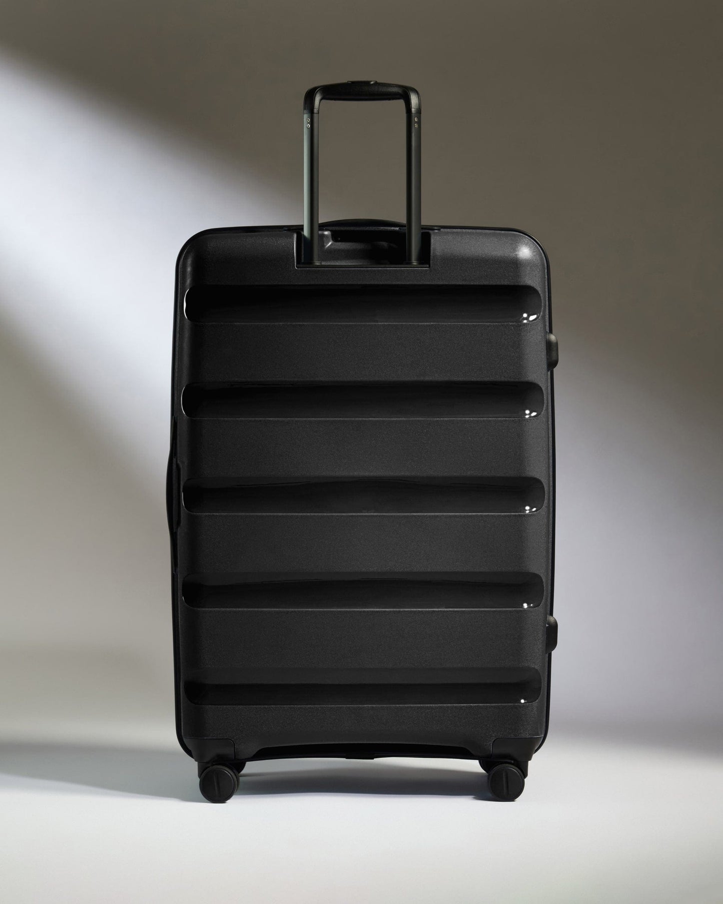 Antler Luggage - Large Suitcase in Black - Logo Stripe - Hard Suitcase - Large Large Suitcase Black - Logo Stripe | Lightweight Hard Shell Luggage