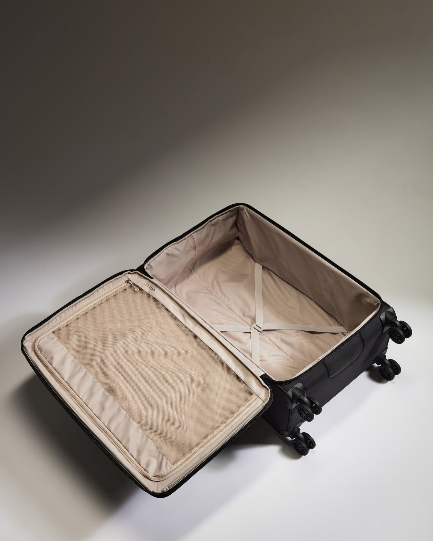 Antler Luggage - Lightest Large Suitcase in Black - Soft Stripe 2.0 - Soft Suitcase Lightest Large Suitcase in Black - Soft Stripe 2.0 | Soft Checked Suitcase