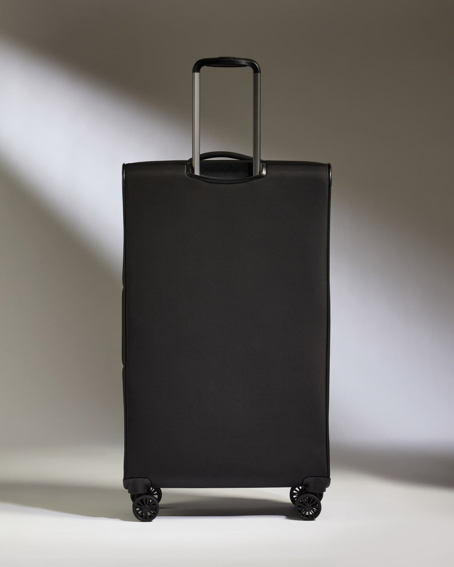 Antler Luggage - Lightest Large Suitcase in Black - Soft Stripe 2.0 - Soft Suitcase Lightest Large Suitcase in Black - Soft Stripe 2.0 | Soft Checked Suitcase