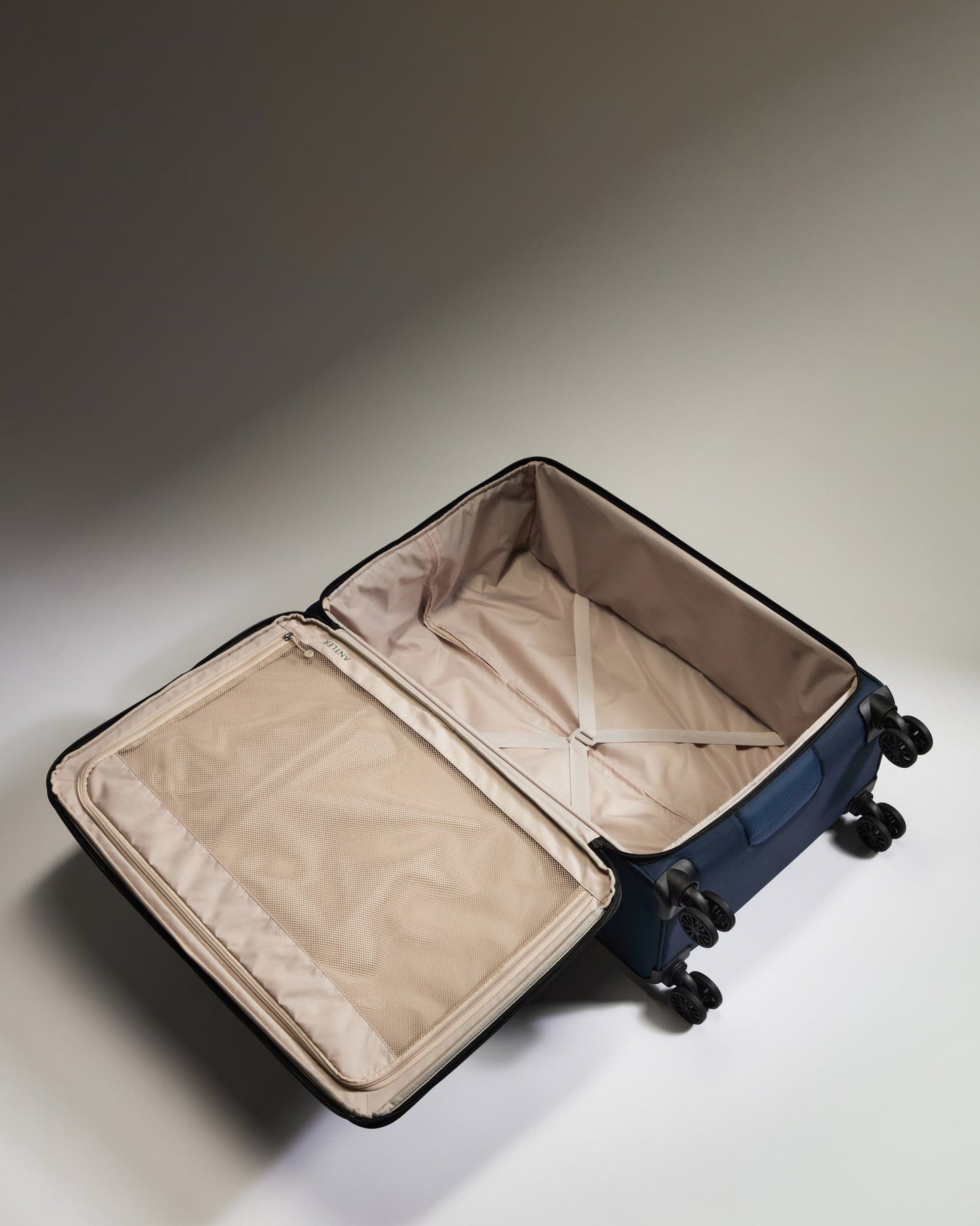 Antler Luggage - Lightest Large Suitcase in Indigo Blue - Soft Stripe 2.0 - Soft Suitcase Lightest Large Suitcase in Navy - Soft Stripe 2.0 | Soft Checked Suitcase