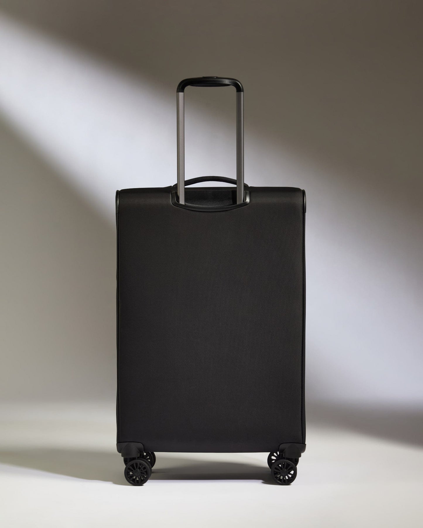 Antler Luggage - Lightest Medium Suitcase in Black - Soft Stripe 2.0 - Soft Suitcase Lightest Medium Suitcase in Black - Soft Stripe 2.0 | Soft Suitcase