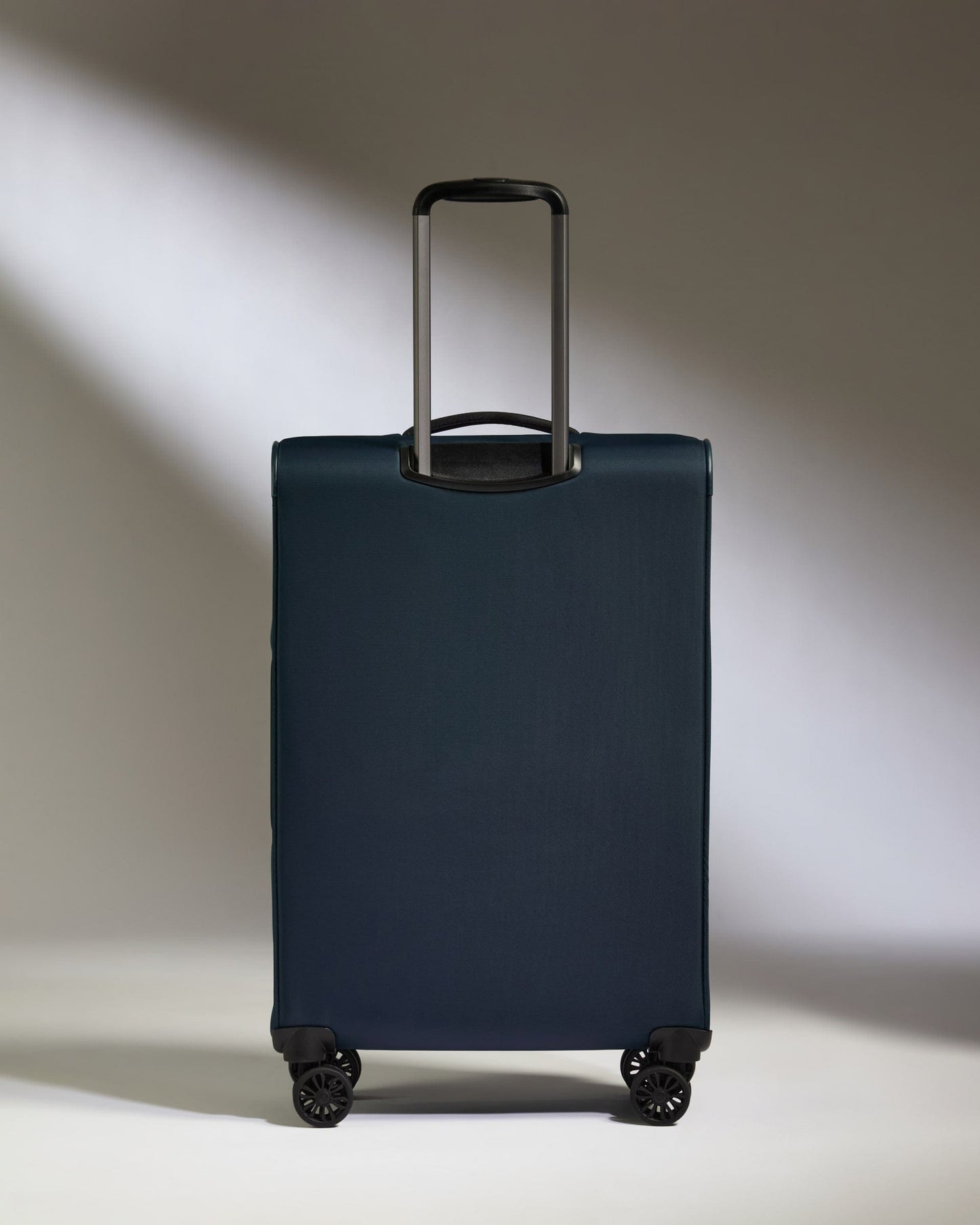 Antler Luggage - Lightest Medium Suitcase in Indigo Blue - Soft Stripe 2.0 - Soft Suitcase Lightest Medium Suitcase in Navy - Soft Stripe 2.0 | Soft Suitcase