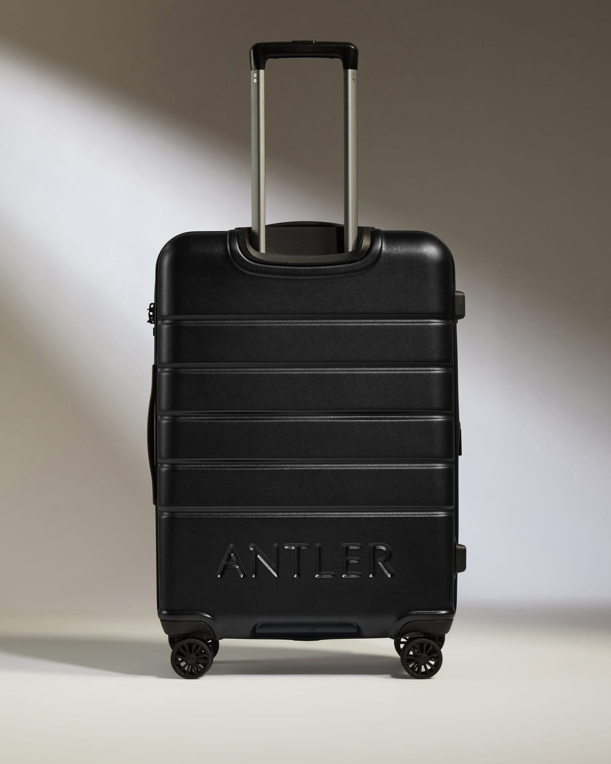 Antler Luggage - Medium Suitcase in Black - Logo - Hard Suitcases Medium Suitcase Black - Logo | Lightweight Hard Shell Luggage