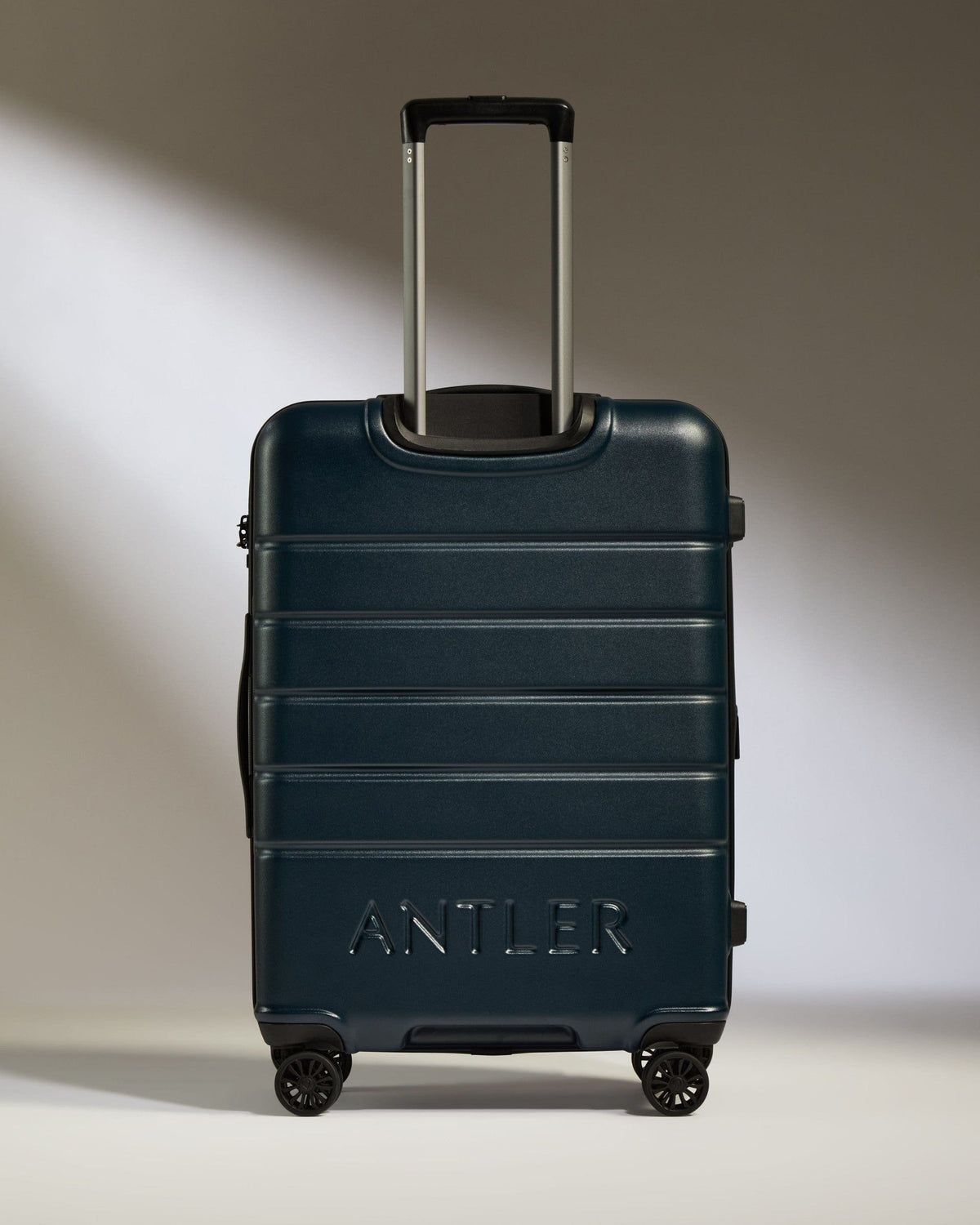 Antler Luggage - Medium Suitcase in Midnight Blue - Logo - Hard Suitcases Medium Suitcase Midnight Blue - Logo | Lightweight Hard Shell Luggage
