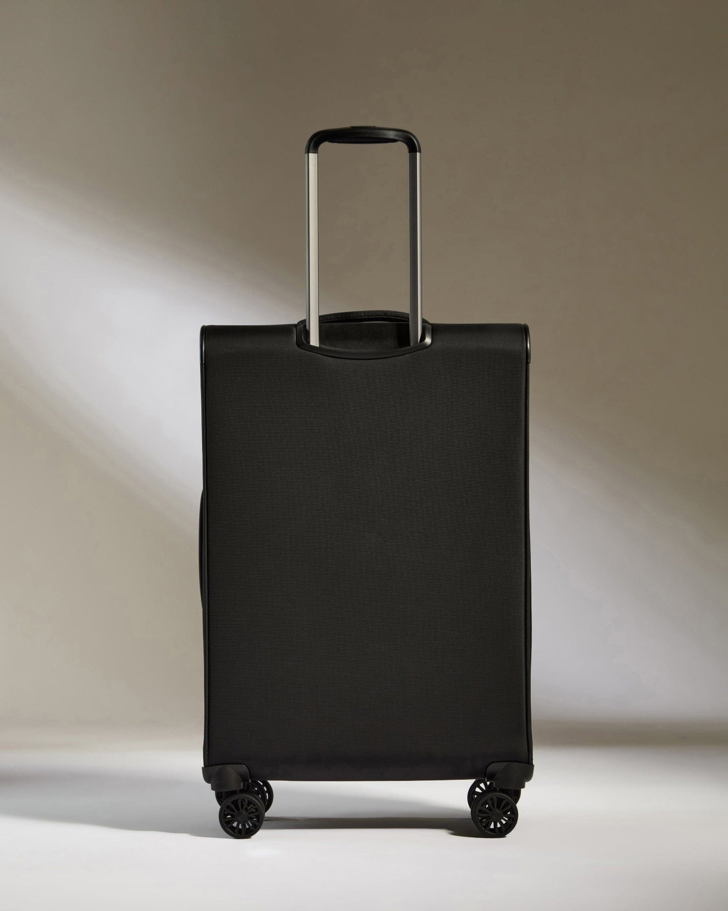 Antler Luggage -  Soft Stripe Medium in Black - Soft Suitcase Soft Stripe Medium in Black | Soft Suitcase