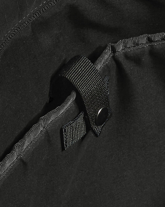 a black strap on a black bag