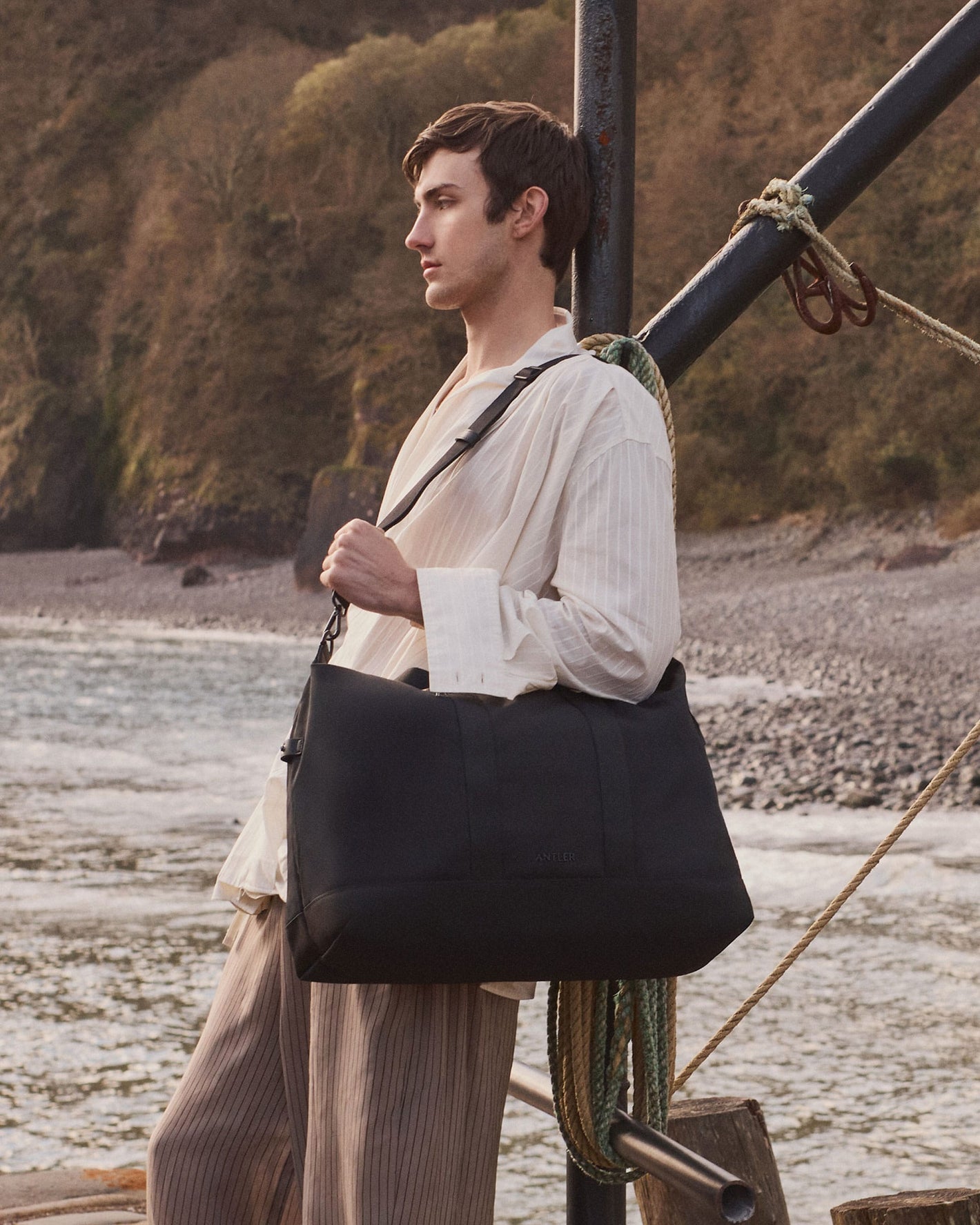 a man standing on a boat