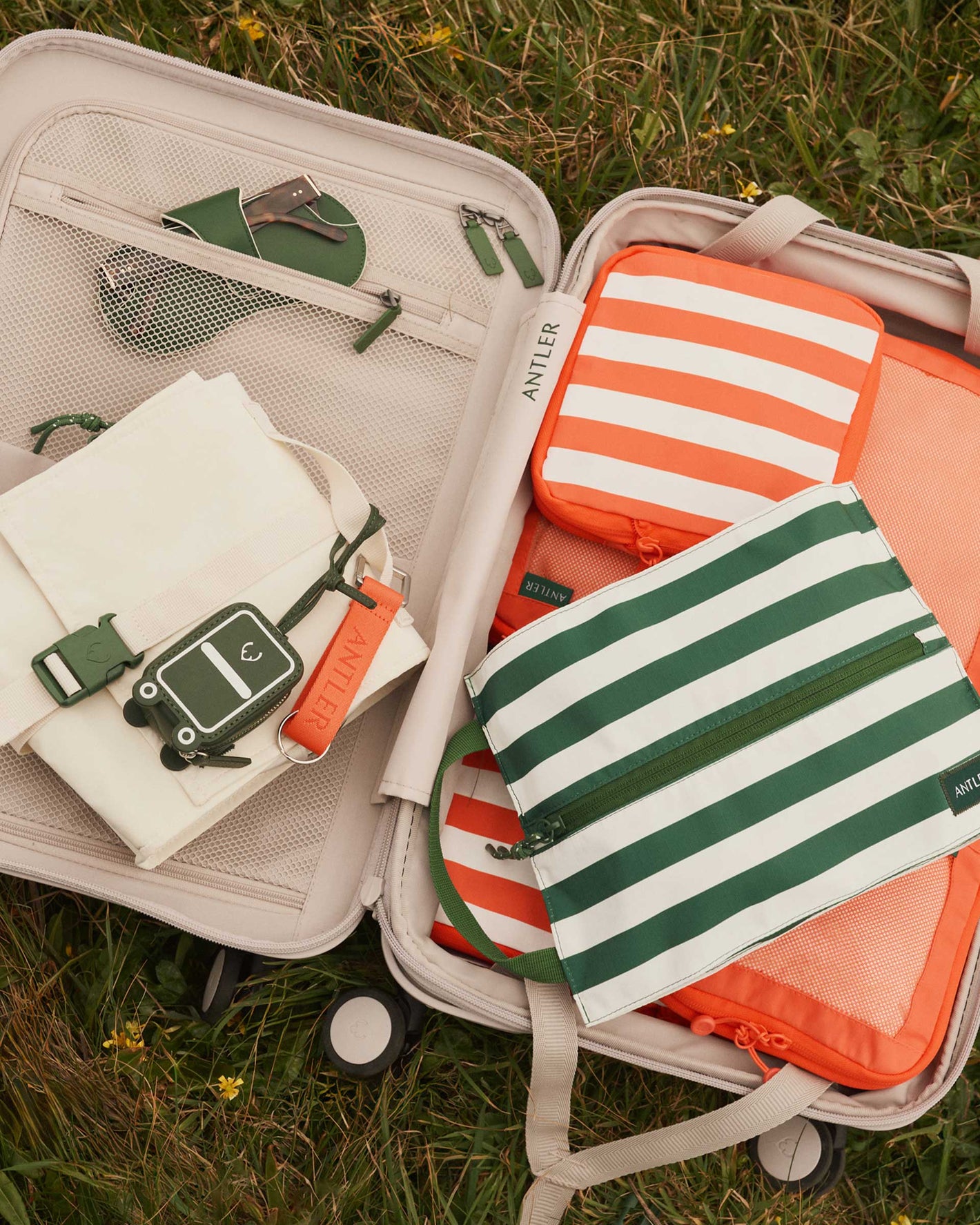a suitcase with different bags in it