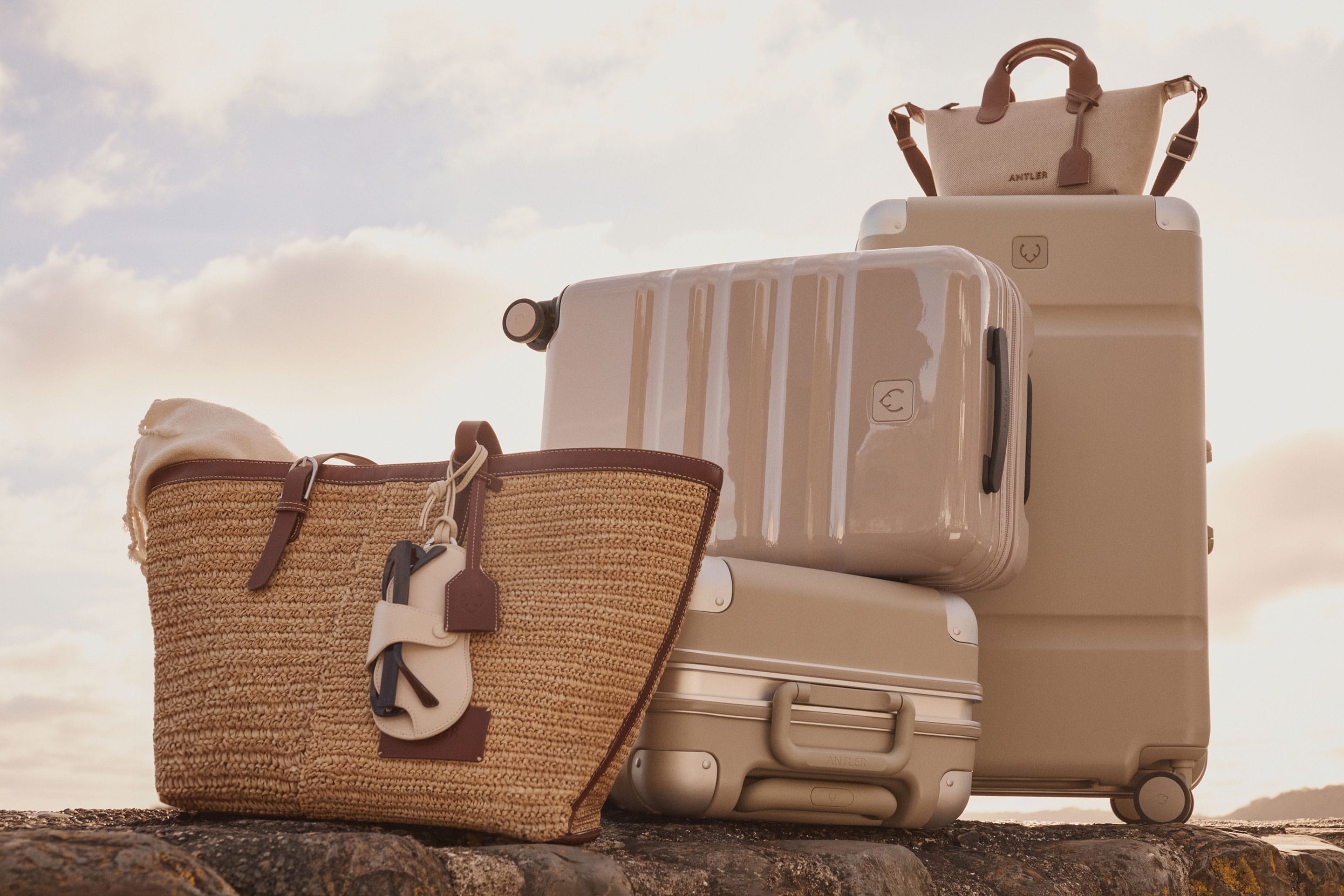 a group of luggage on a rock