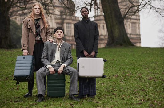 a group of people with luggage
