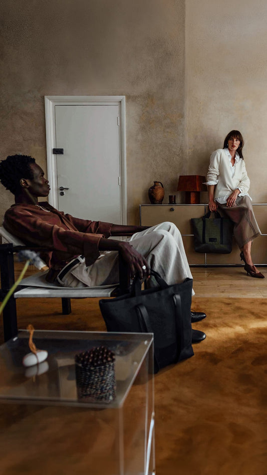 a man and woman sitting in chairs