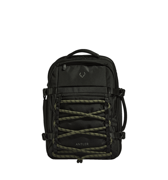 a black backpack with green laces