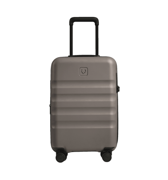 a grey suitcase with wheels
