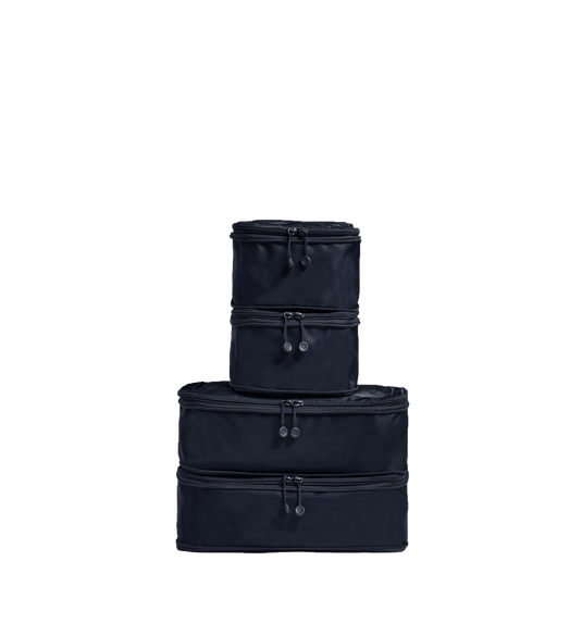 a stack of black bags