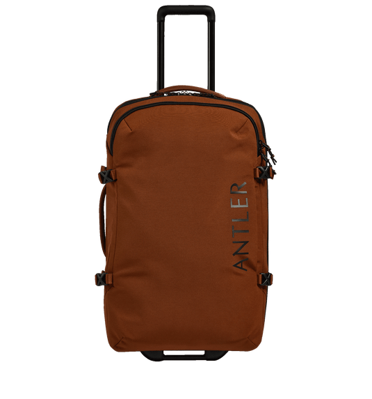 a brown suitcase with wheels