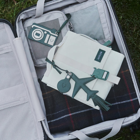 luggage in a suitcase with luggage tags
