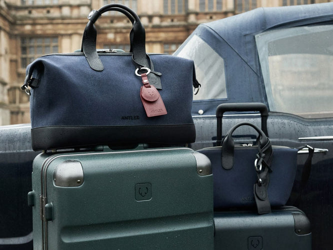 a group of luggage on top of each other