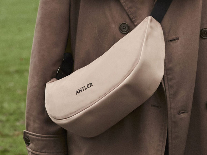 a person wearing a brown coat