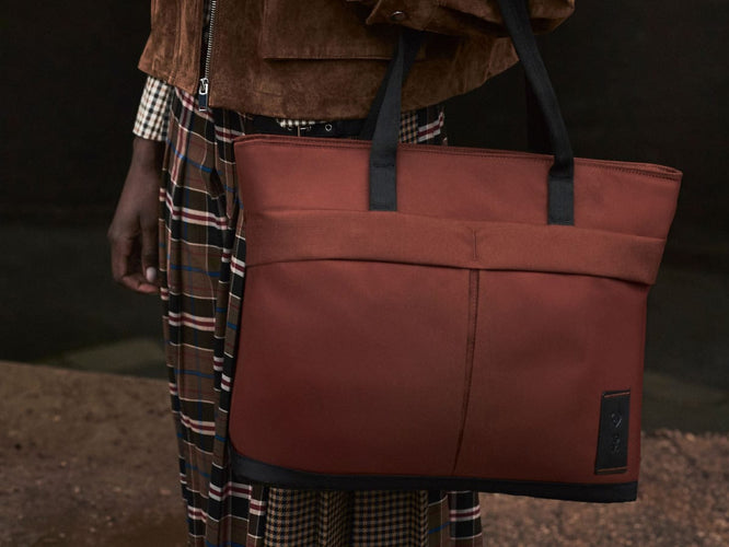 a person holding a bag