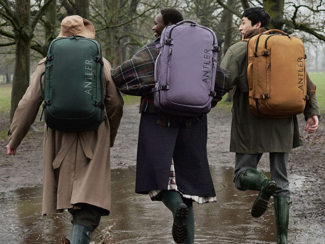 a group of people walking in a puddle