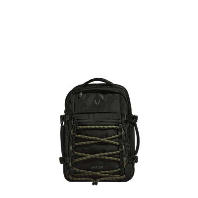 a black backpack with green straps