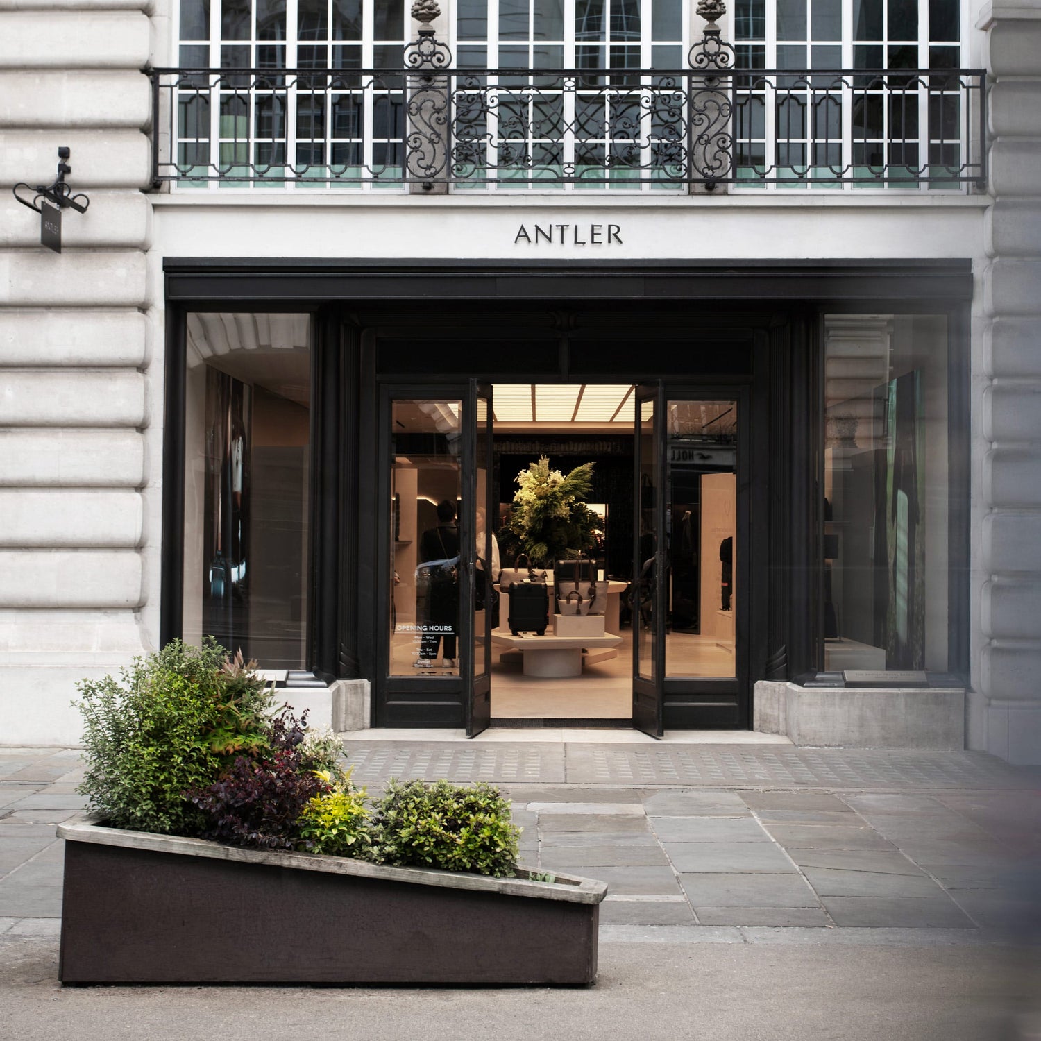 a building with glass doors and windows