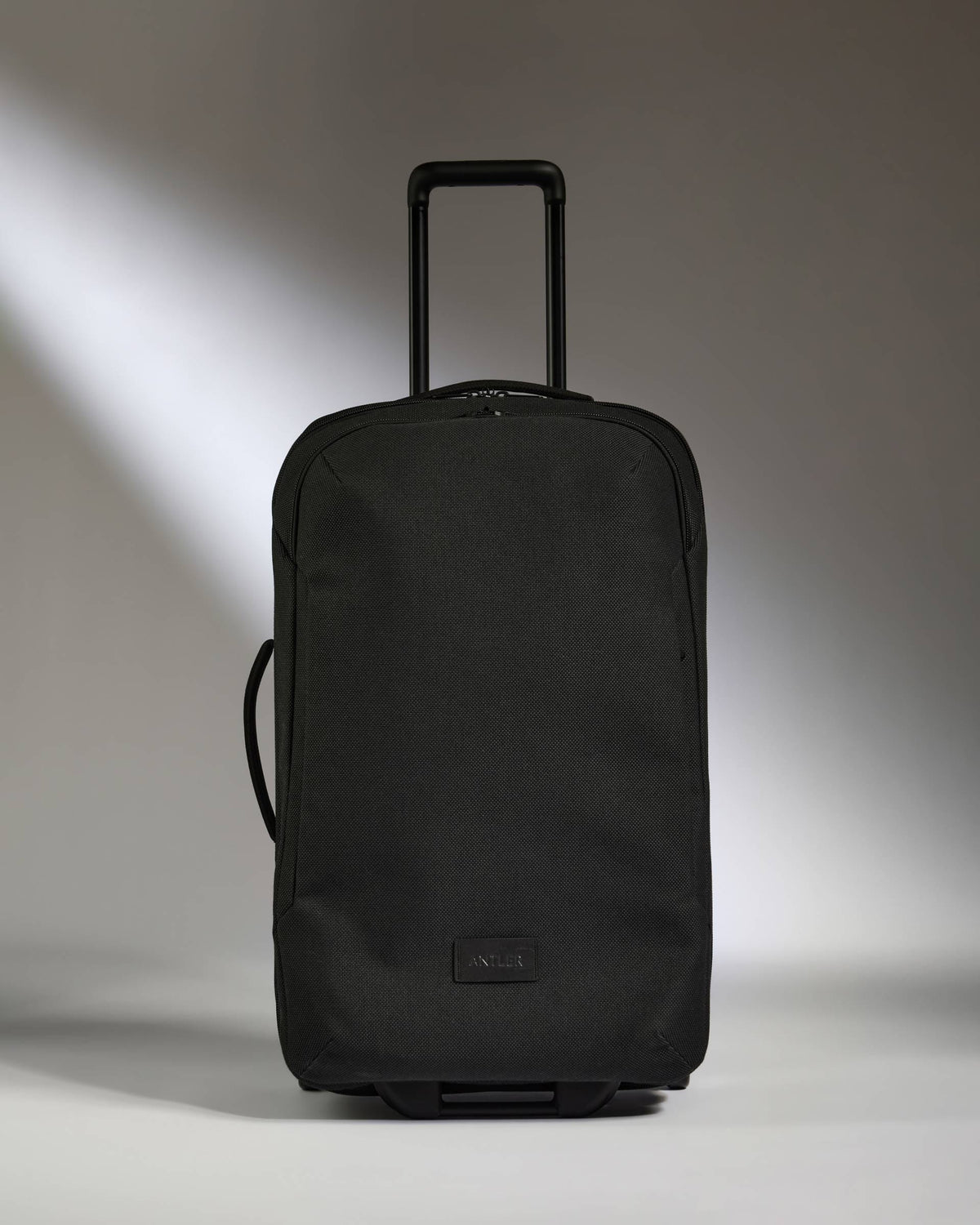 Antler Luggage -  Antler Weave Wheeled Duffel in Black - Wheeled Duffle Antler Weave Wheeled Duffel in Black | Holdall Bag & Suitcase