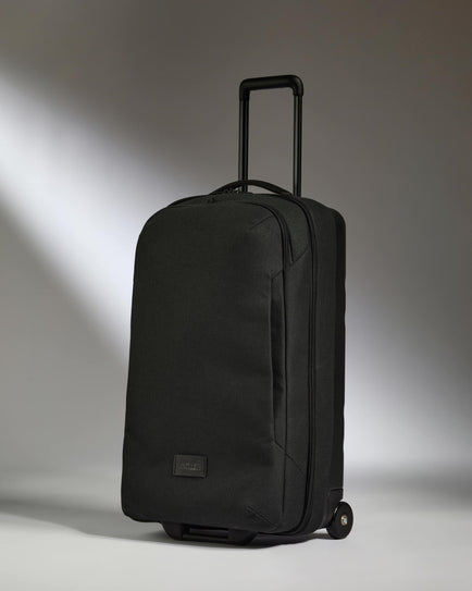 Antler Luggage -  Antler Weave Wheeled Duffel in Black - Wheeled Duffle Antler Weave Wheeled Duffel in Black | Holdall Bag & Suitcase