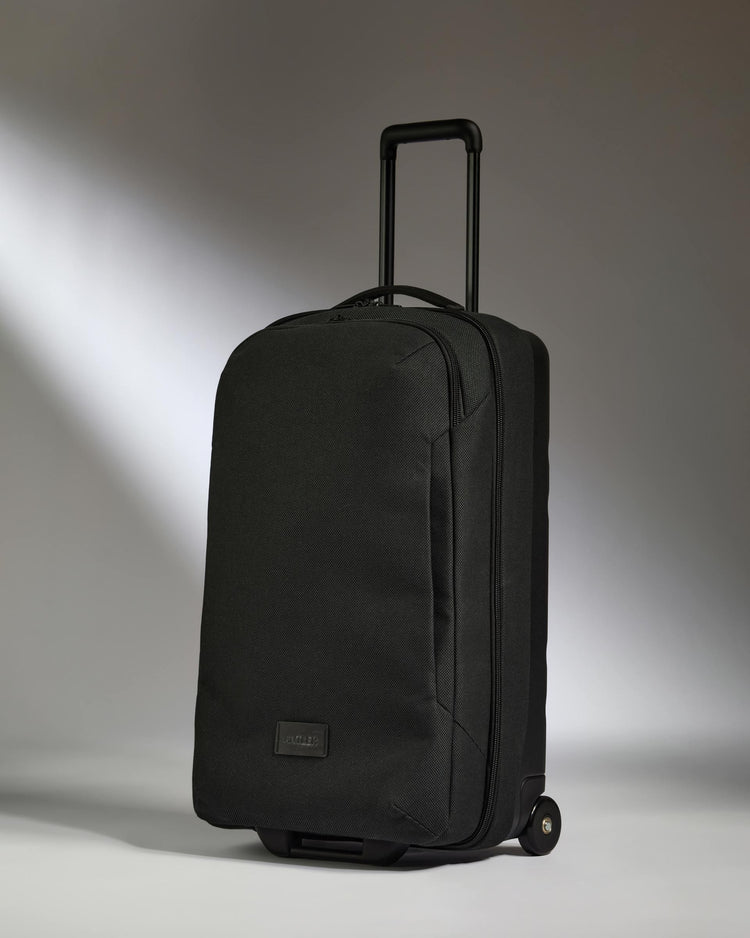 Antler Luggage -  Antler Weave Wheeled Duffel in Black - Wheeled Duffle Antler Weave Wheeled Duffel in Black | Holdall Bag & Suitcase