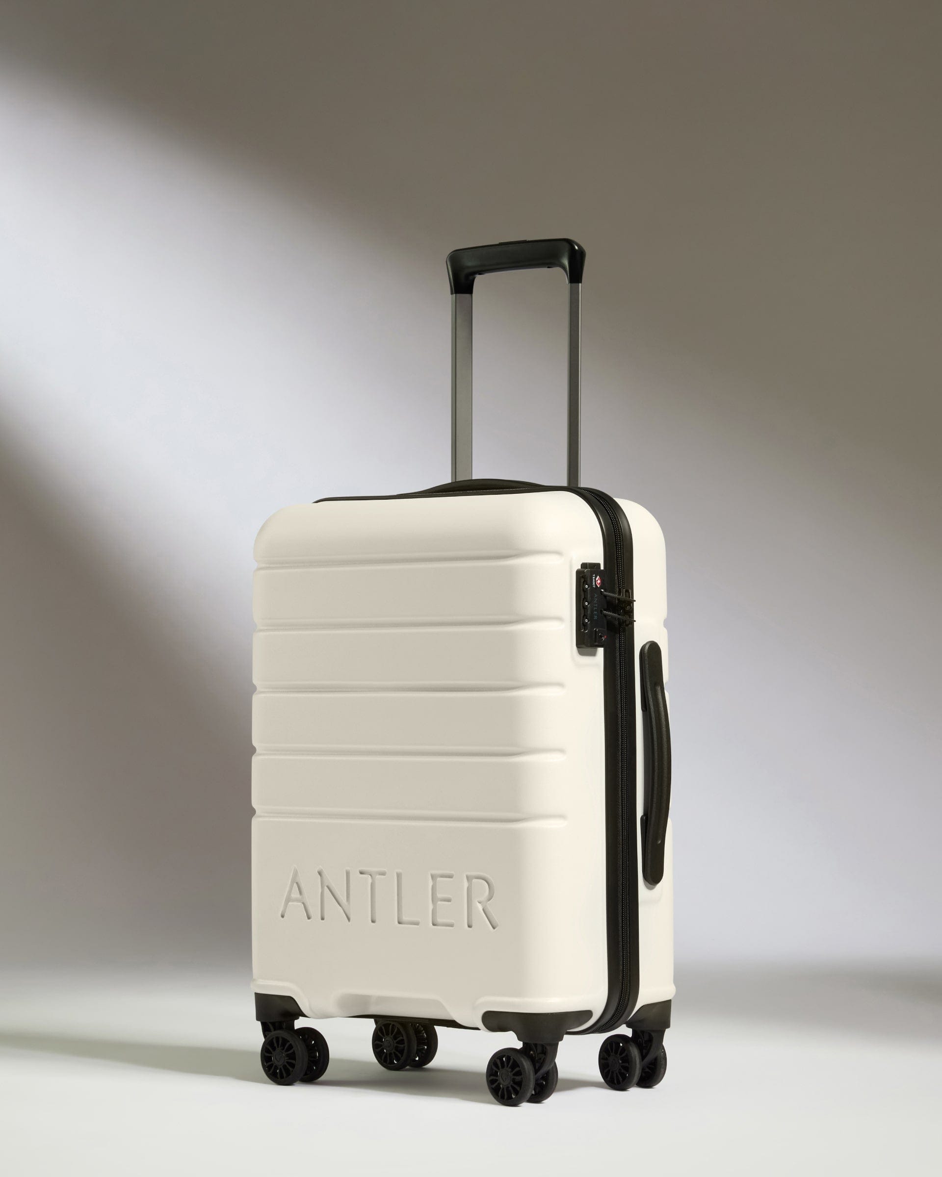 Cabin Suitcase in White Logo Lightweight Hard Shell Luggage Antler UK