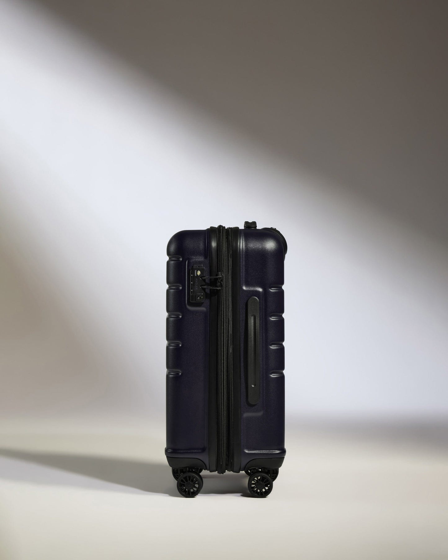 Antler Luggage -  Cabin Suitcase in Dark Purple - Logo - Hard Suitcase - Standard Cabin Cabin Suitcase Dark Purple - Logo | Lightweight Hard Shell Luggage