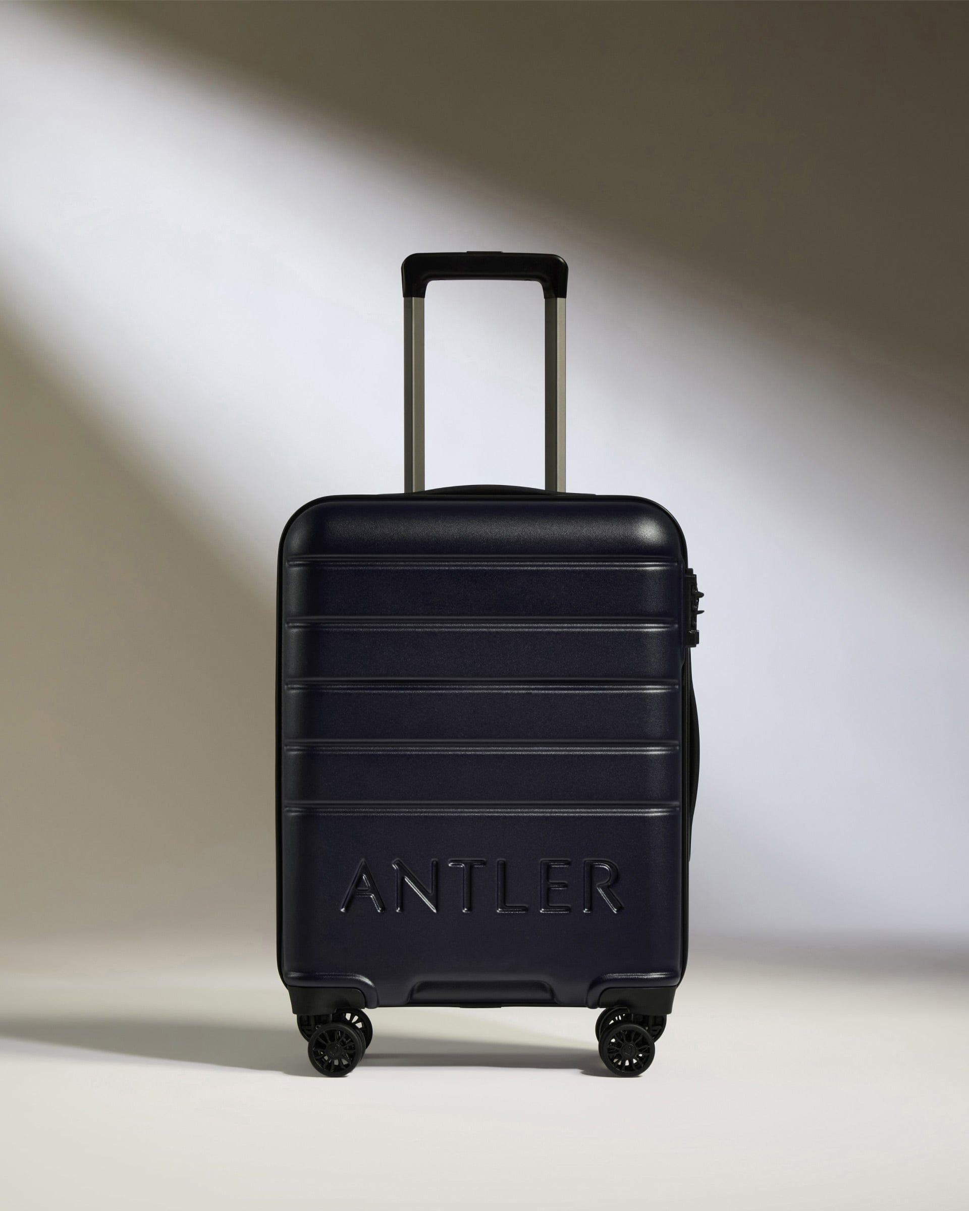 Antler Luggage -  Cabin Suitcase in Dark Purple - Logo - Hard Suitcase - Standard Cabin Cabin Suitcase Dark Purple - Logo | Lightweight Hard Shell Luggage