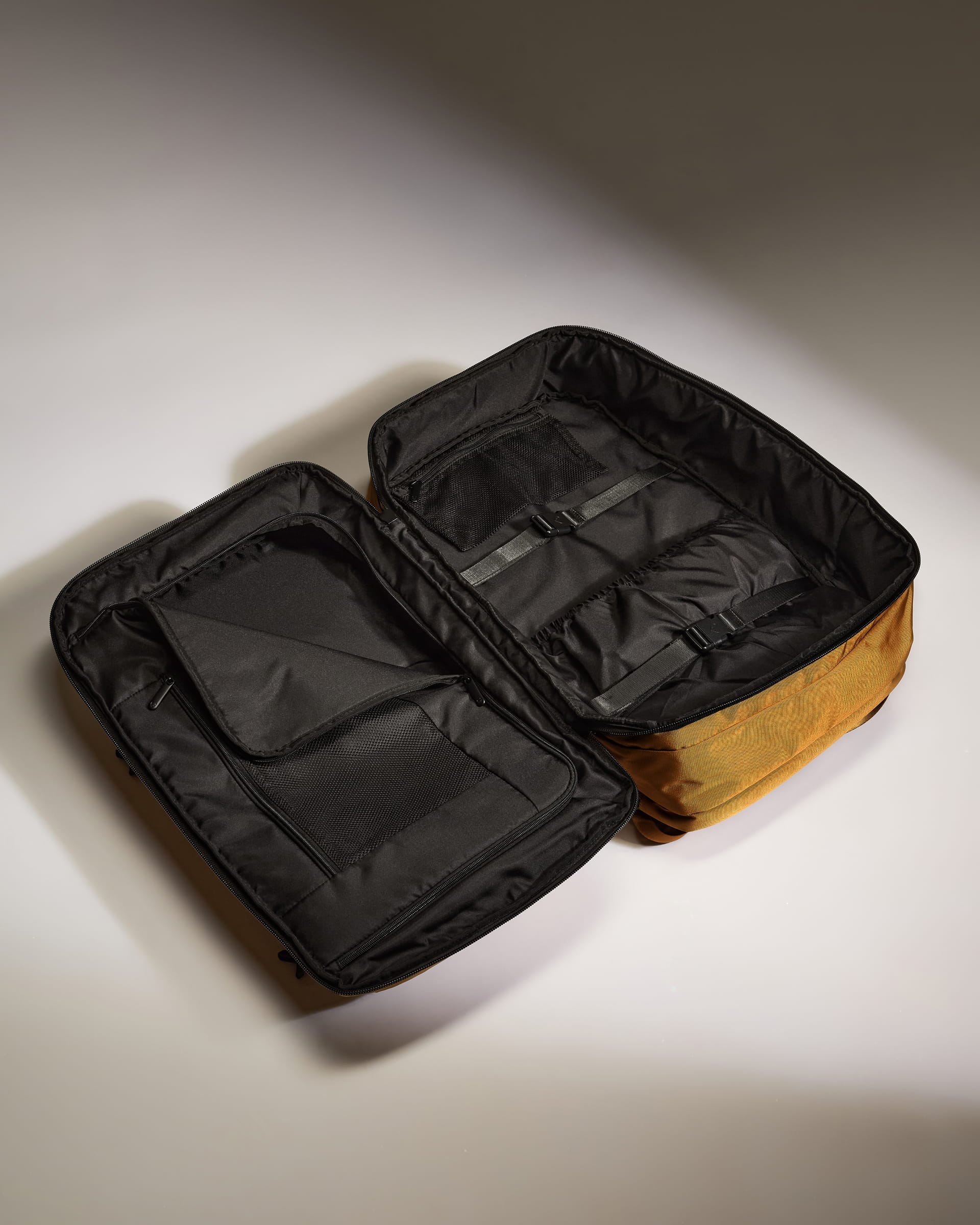 Antler Luggage -  Discovery 60L Backpack in Mustard Yellow - Backpack | Large Discovery 60L Backpack in Yellow | Rucksacks & Travel Bags