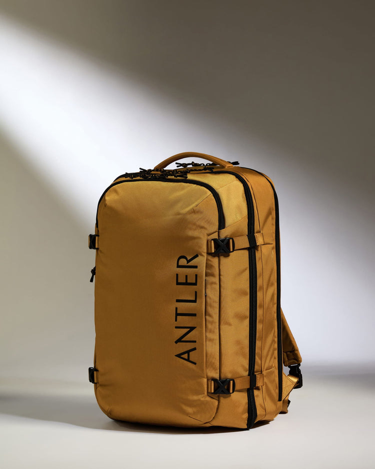 Antler Luggage -  Discovery 60L Backpack in Mustard Yellow - Backpack | Large Discovery 60L Backpack in Yellow | Rucksacks & Travel Bags