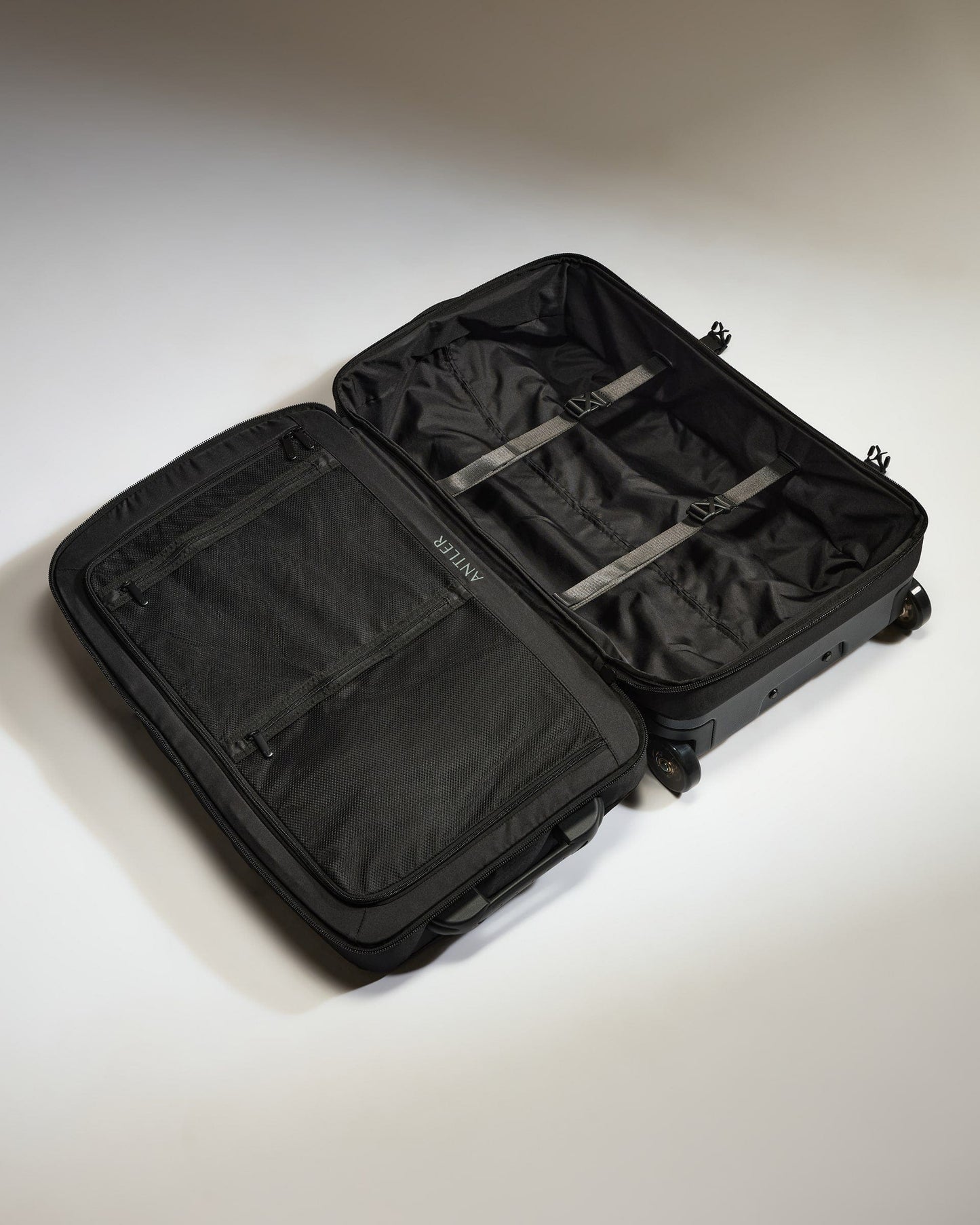 Antler Luggage -  Discovery Wheeled Duffel in Black - Wheeled Duffle Discovery Wheeled Duffel in Black | Holdall Bag & Suitcase