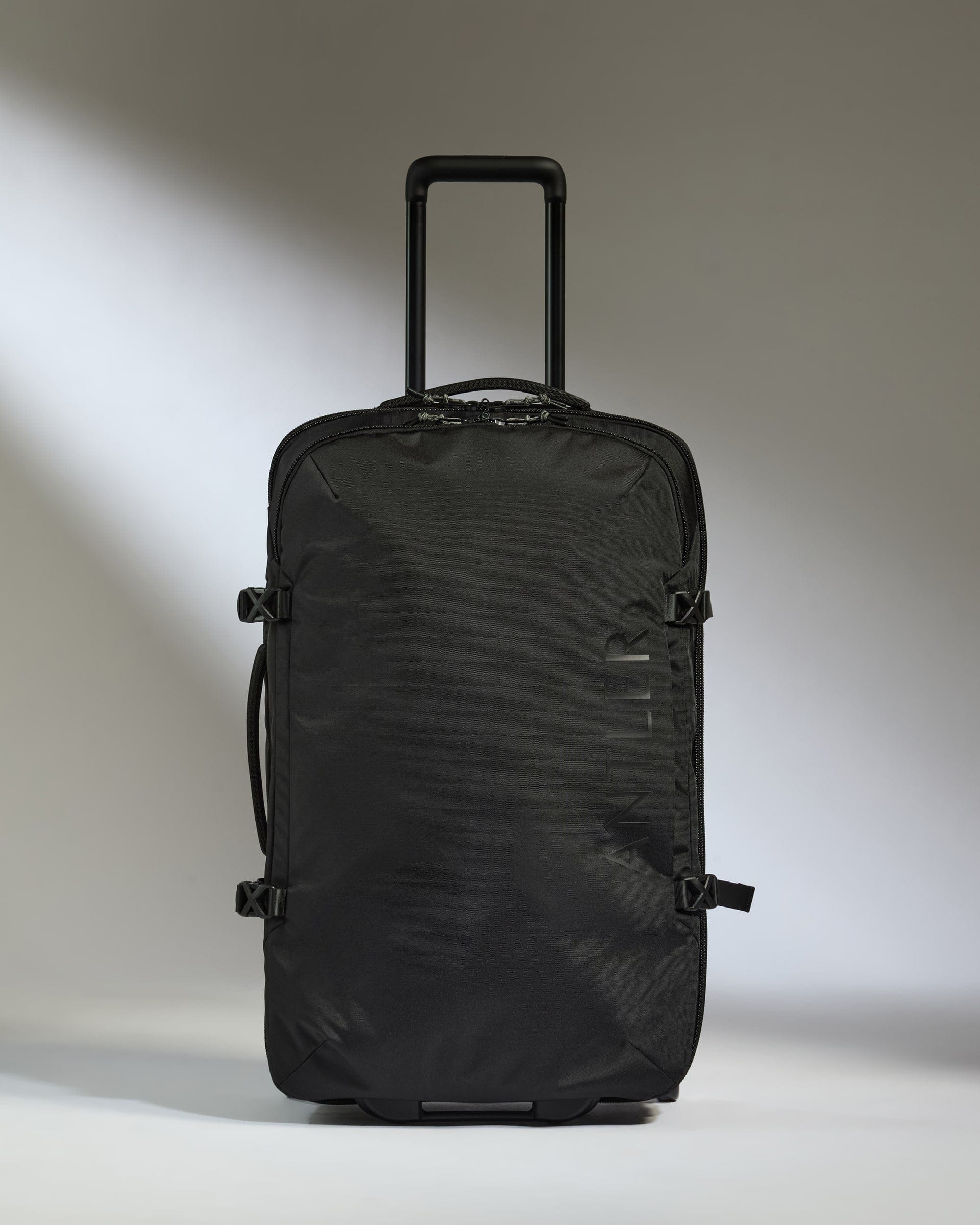 Antler Luggage -  Discovery Wheeled Duffel in Black - Wheeled Duffle Discovery Wheeled Duffel in Black | Holdall Bag & Suitcase