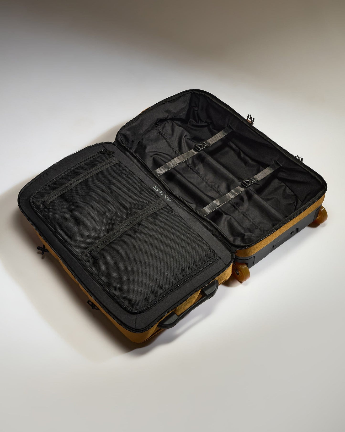 Antler Luggage -  Discovery Wheeled Duffel in Mustard Yellow - Wheeled Duffle Discovery Wheeled Duffel in Yellow | Holdall Bag & Suitcase