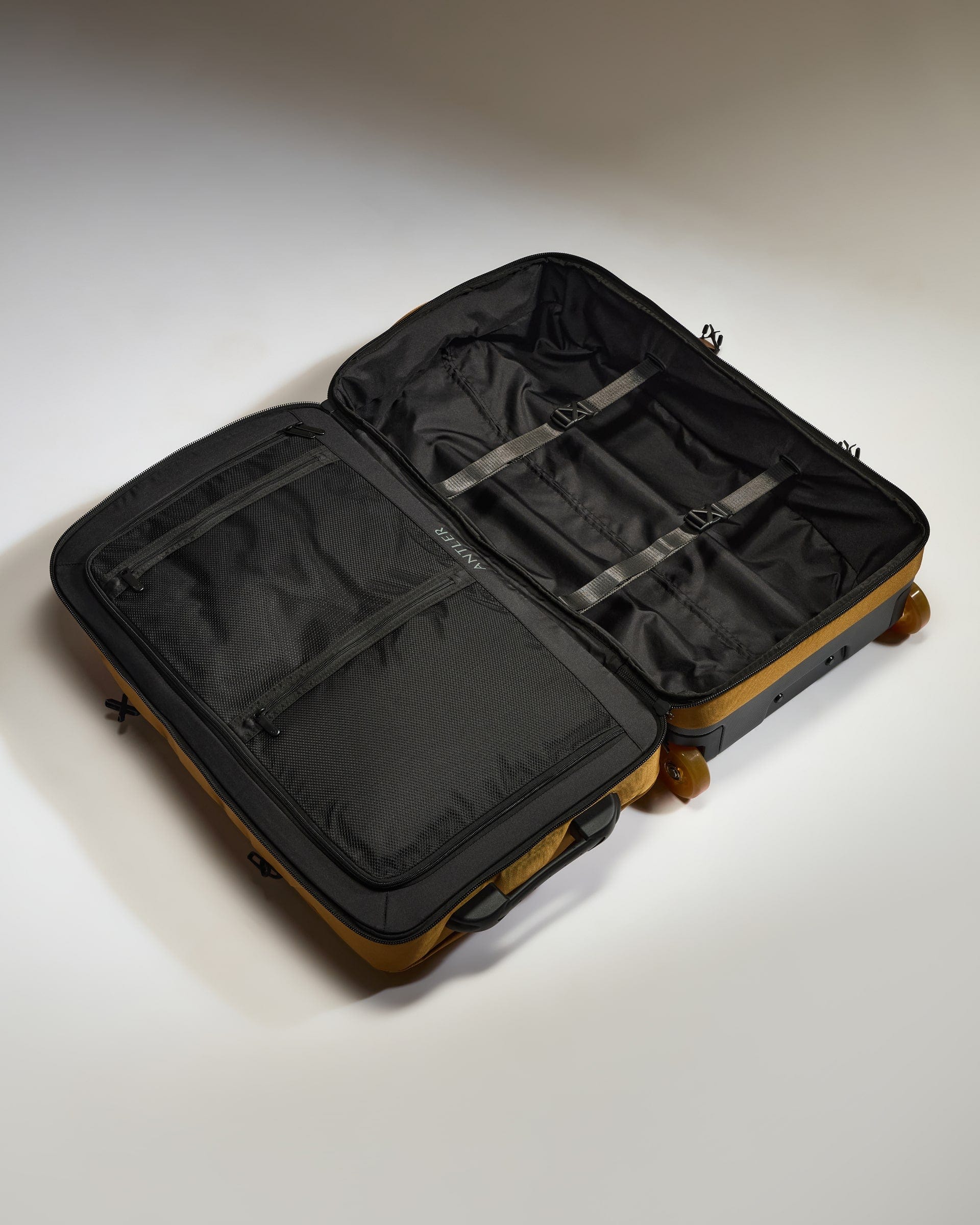 Antler Luggage -  Discovery Wheeled Duffel in Mustard Yellow - Wheeled Duffle Discovery Wheeled Duffel in Yellow | Holdall Bag & Suitcase