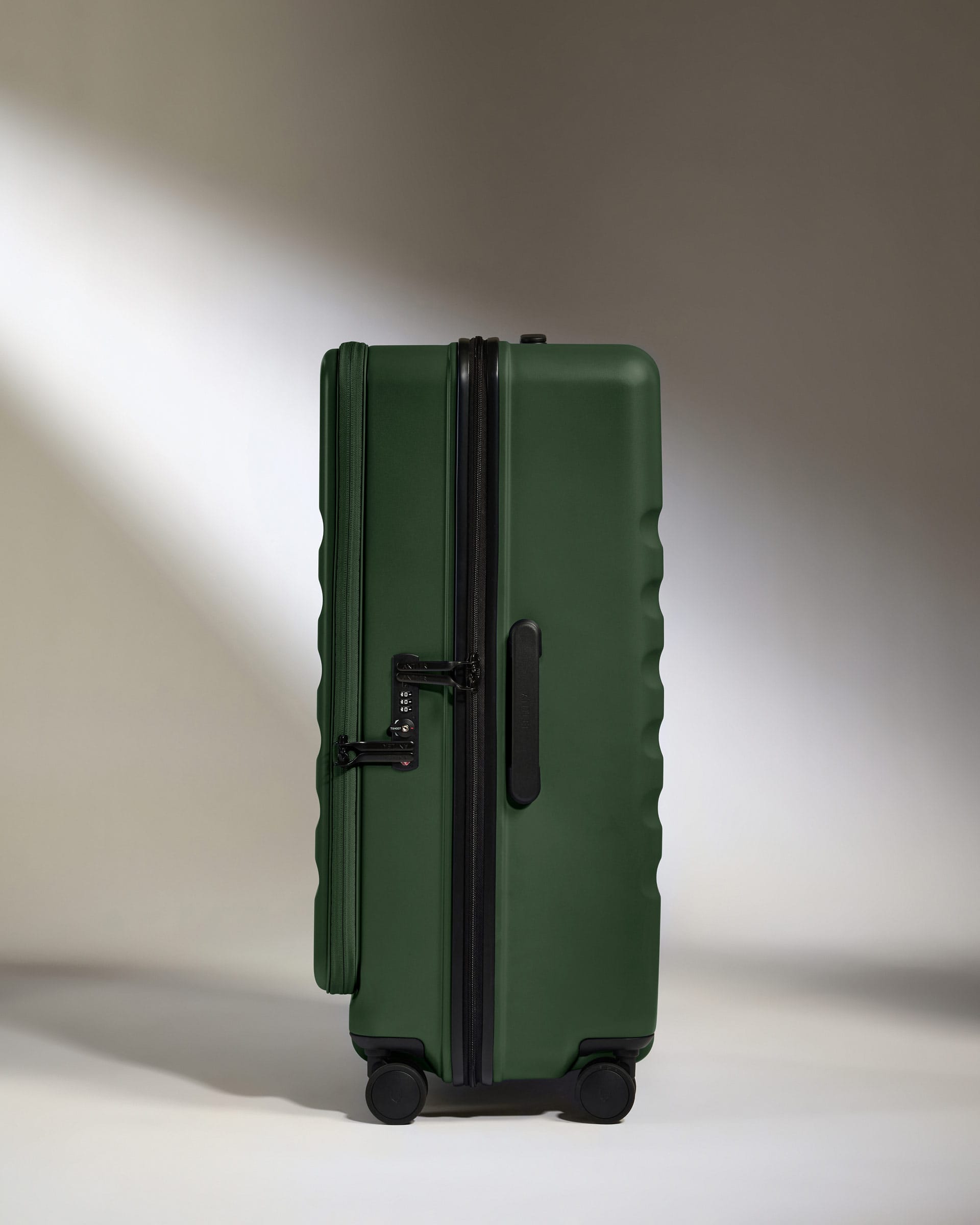 Antler Luggage -  Dual Opening Large Suitcase in Antler Green - Icon Stripe - Hard Suitcase - Large Dual Opening Large Suitcase in Green - Icon Stripe | Lightweight & Hard Shell Suitcase