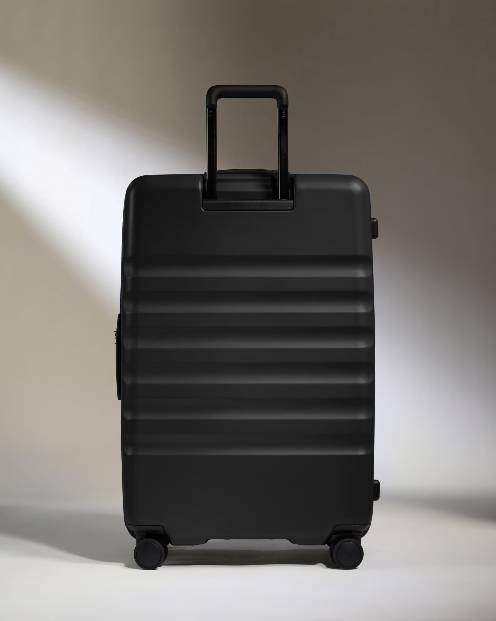 Antler Luggage -  Dual Opening Large Suitcase in Black - Icon Stripe - Hard Suitcase - Large Dual Opening Large Suitcase in Black - Icon Stripe | Lightweight & Hard Shell Suitcase