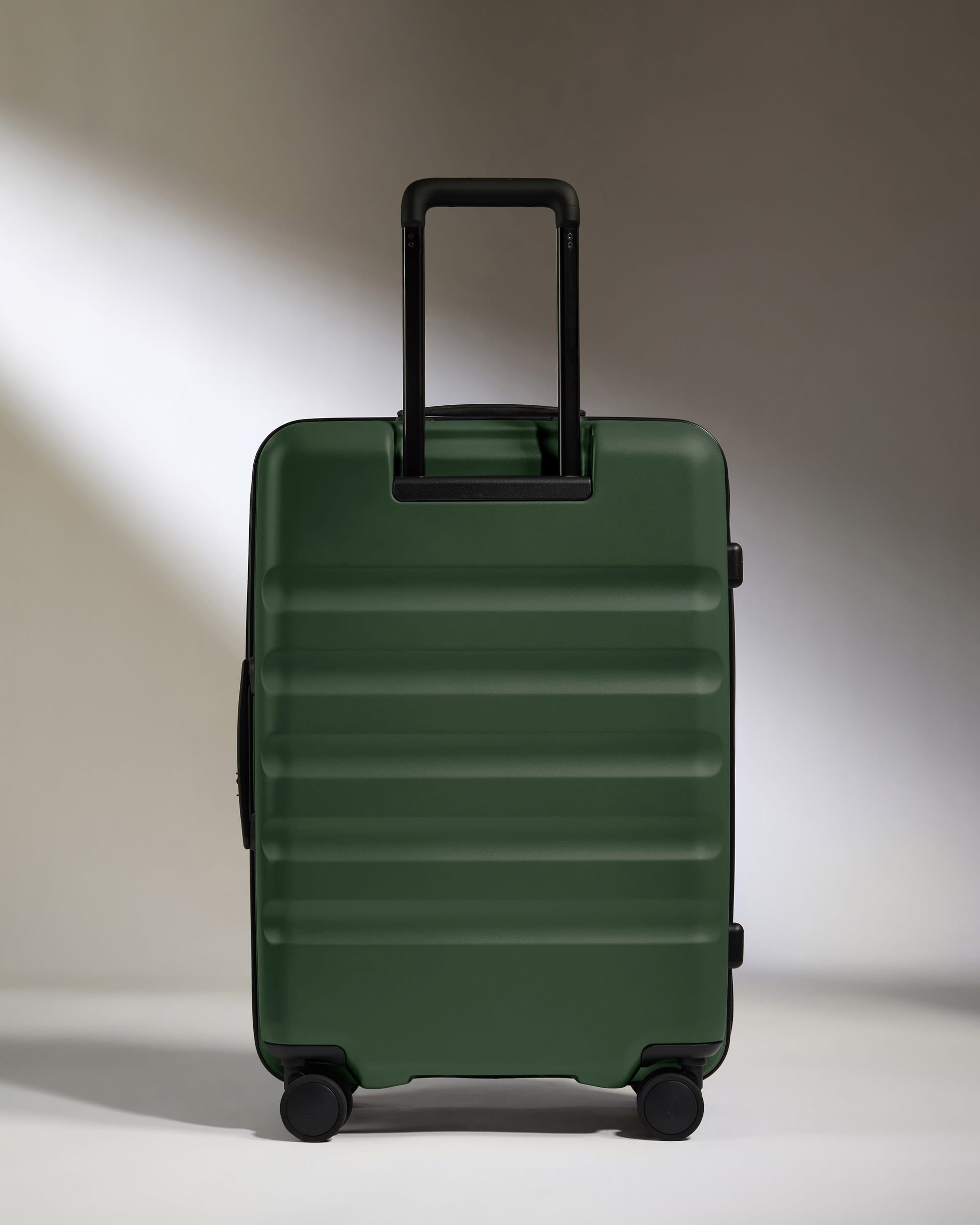Antler Luggage -  Dual Opening Medium Suitcase in Antler Green - Icon Stripe - Expanding Rollercase | Medium 4W Dual Opening Medium Suitcase in Green - Icon Stripe | Lightweight & Hard Shell Suitcase