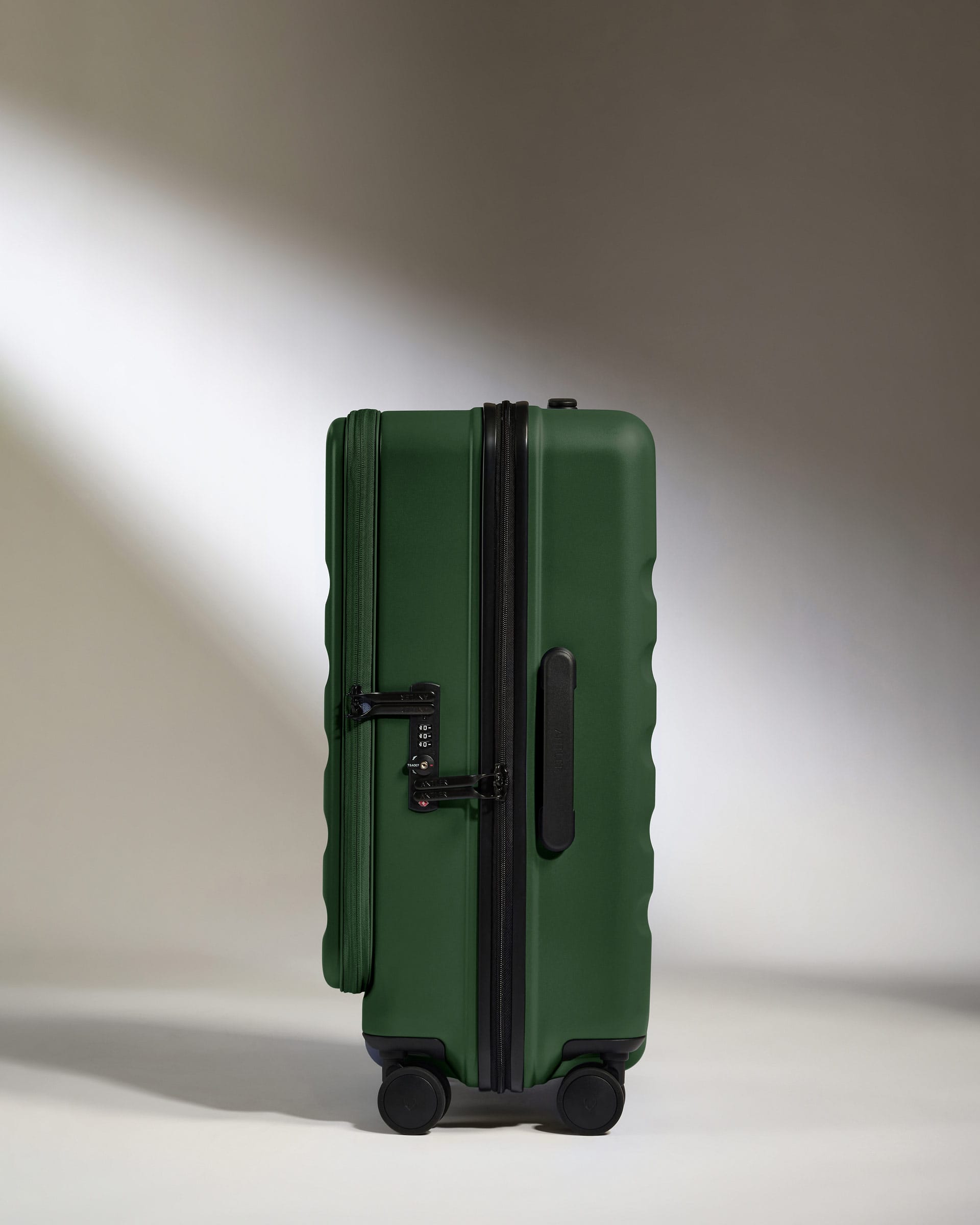 Antler Luggage -  Dual Opening Medium Suitcase in Antler Green - Icon Stripe - Expanding Rollercase | Medium 4W Dual Opening Medium Suitcase in Green - Icon Stripe | Lightweight & Hard Shell Suitcase