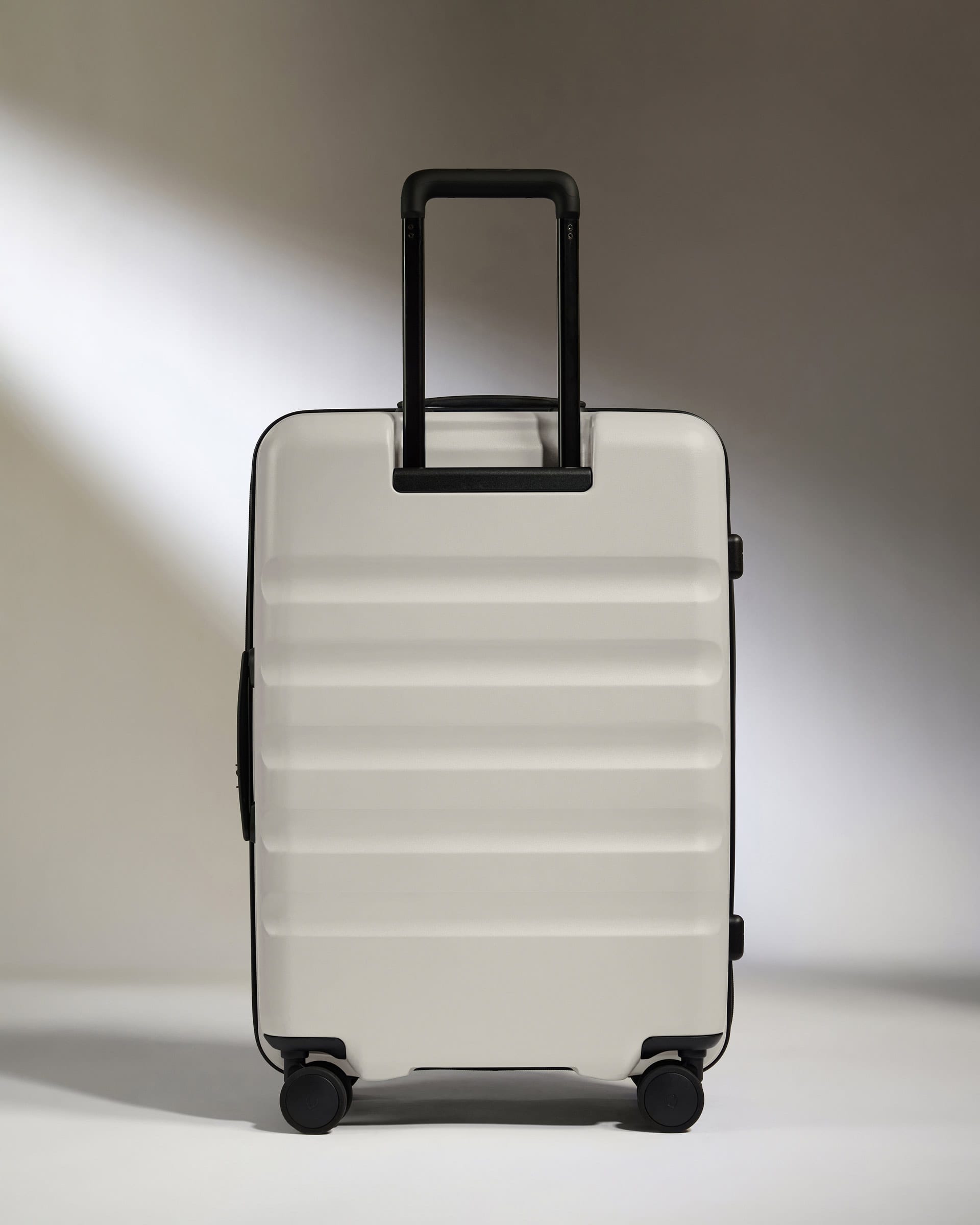 Antler Luggage -  Dual Opening Medium Suitcase in Taupe - Icon Stripe - Expanding Rollercase | Medium 4W Dual Opening Medium Suitcase in Neutral - Icon Stripe | Lightweight & Hard Shell Suitcase