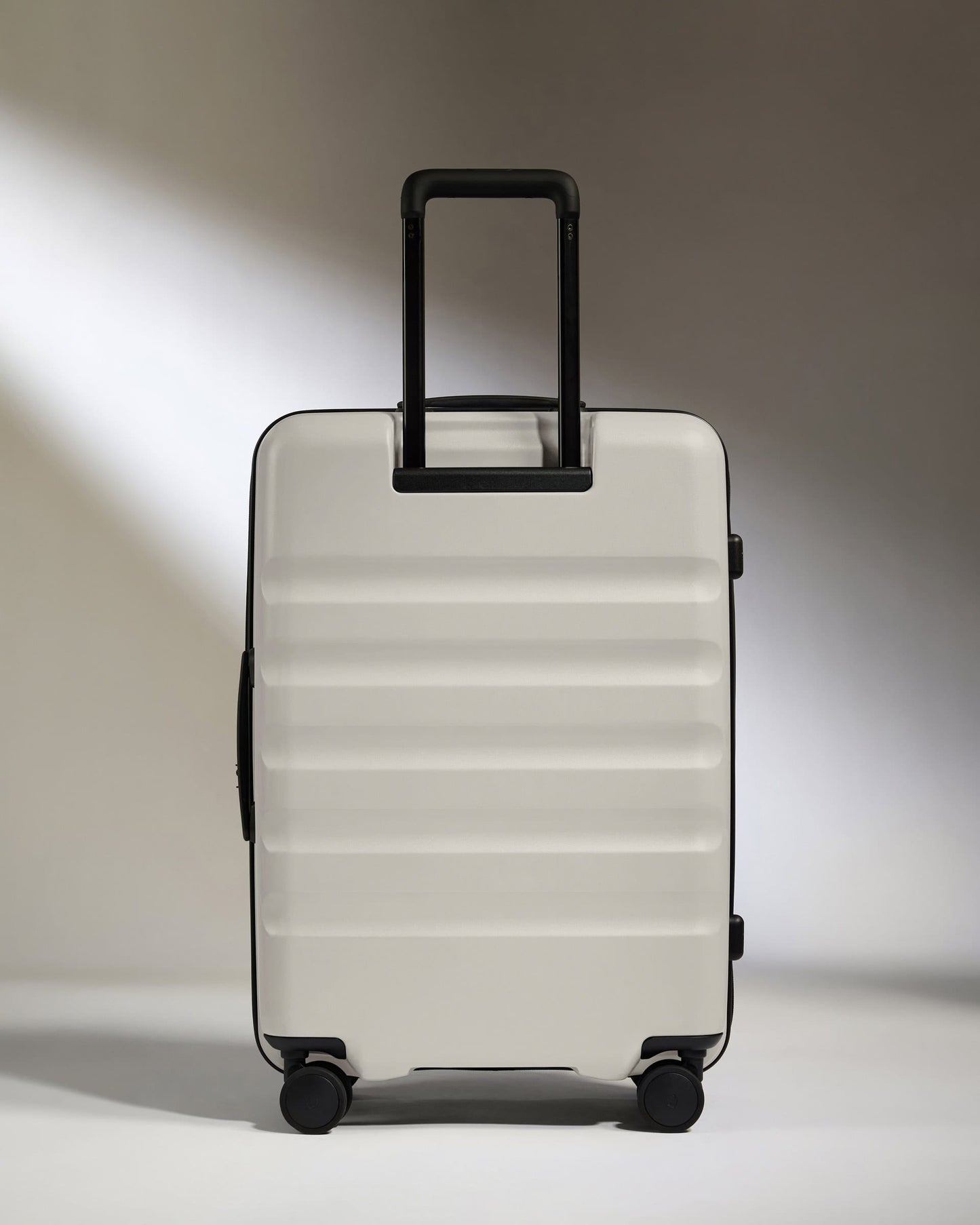 Antler Luggage -  Dual Opening Medium Suitcase in Taupe - Icon Stripe - Expanding Rollercase | Medium 4W Dual Opening Medium Suitcase in Neutral - Icon Stripe | Lightweight & Hard Shell Suitcase